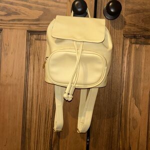 mini yellow backpack